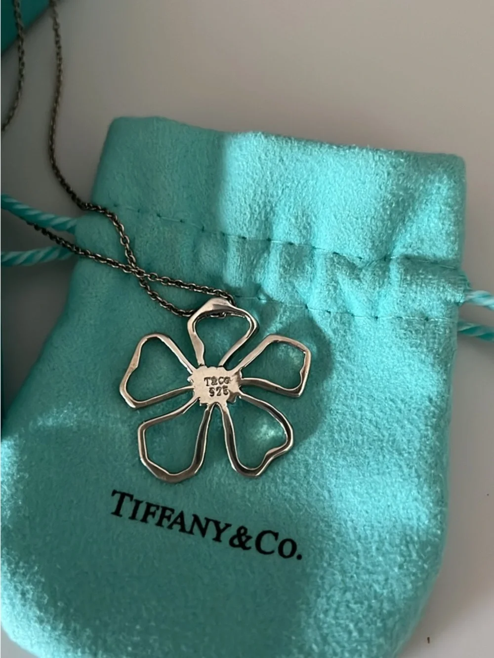 Tiffany & Co. Retired Sterling, silver hibiscus pendant necklace.